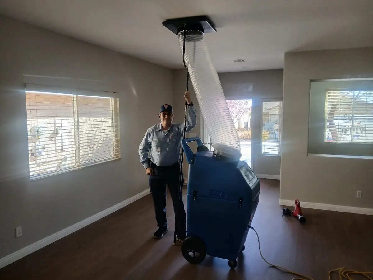 Professional Dryer Vent Cleaning work inside a Flint home